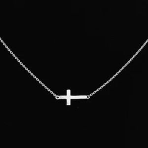 Silpada dainty cross necklace.